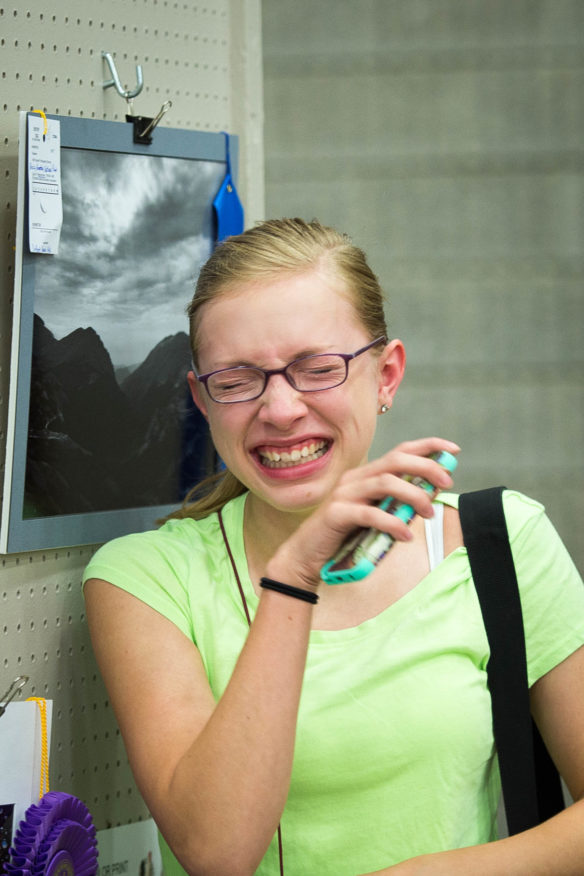 Olivia Sandqvist reacts after finding out that her photo won grand champion in her division and was awarded the best color digital print at the Kentucky State Fair. Photo by Bobby Ellis, Aug. 18, 2016