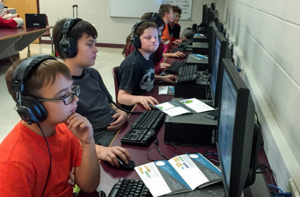 Students at South Livingston Elementary School (Livingston County) work on creating video games in the Coding Club, part of the school's Mustang Roundup Academy 21st Century Community Learning Centers program. Photo submitted