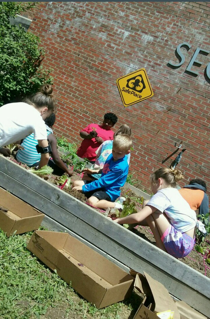 Second Street Elementary School (Frankfort Independent) 3rd-graders plant a community garden during a recent Beautification Day. Submitted photo by Dana Dickerson