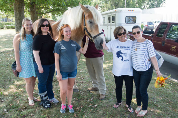 Staff members of Julius Marks Elementary (Fayette) pose with Mercy, the spokesmodel for "Take the Reins," a service learning project piloted at Julius Marks dedicated to showing students different paths in the equine related industry.  Photo by Bobby Ellis, Aug. 29, 2016