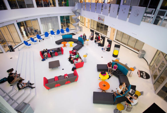 Students sit in the community area of the new Ed Hub at Eminence Middle and High School (Henry County). The Ed Hub features eight different lab rooms, extra large TV monitors and a slide for students. Photo by Bobby Ellis, Sept. 15, 2016