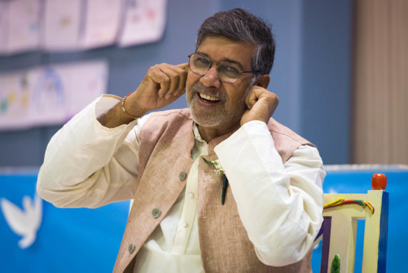 Kailash Satyarthi sings along with a song being sung by Maxwell Elementary (Fayette County) students during his visit to the school. Photo by Bobby Ellis, Sept. 23, 2016
