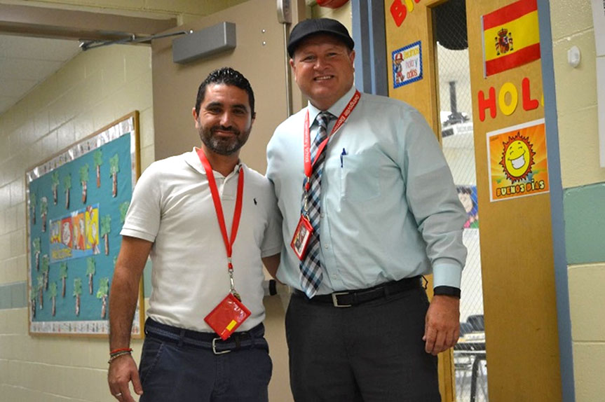 Señor Francisco Luque, left, is part of a cultural leadership exchange program and travels to different countries each year teaching about the Spanish language and culture. This year, he is teaching at Owingsville Elementary School (Bath County). Here he is pictured with Owingsville Principal Mark Leet. Submitted photo by Cecil Lawson