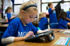 Abby Gabbenesch, a 2nd-grader at Moyer Elementary (Ft. Thomas Independent) works on her iPad during class. This year every student in school, kindergarten through 5th grade, was given an iPad. Photo by Bobby Ellis, Oct. 20, 2016