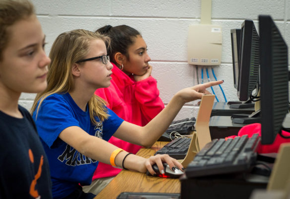 Destiny Barrancotta, a 7th-grader at Foley Middle School, works on a coding game during the Hour of Code. Photo by Bobby Ellis, Dec. 7, 2016