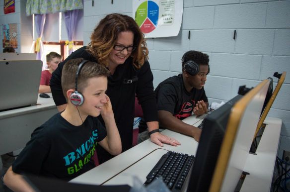 Chris Begley, a 7th-grader at B. Michael Caudill Middle School (Madison County), Ashley Griggs, and Edgren Sweat make games during the Hour of Code. Photo by Bobby Ellis, Dec. 7, 2016