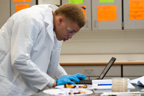 Cameron Rose, a senior at Dunbar High School (Fayette) writes down notes during a lab meant to show the effect of decay on food at the Locust Trace Agriscience Center. Photo by Bobby Ellis, Jan. 17, 2017