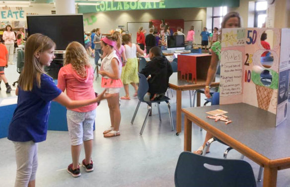 Movable furniture and an open design were key to the redesign of the library at Emma B. Ward Elementary School (Anderson County). The extra space allows for more schoolwide events to take place in the library, such as this 2nd-grade carnival, where students created games and invited their fellow classmates to play them. Submitted photo by Tanya Blackhurst