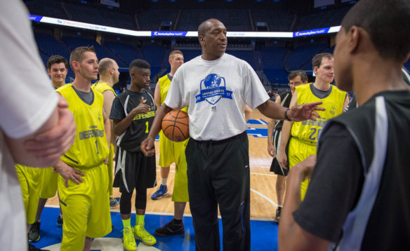 Jack "Goose" Givens gives tips to Special Olympics athletes during a skills clinic at Rupp Arena. Photo by Bobby Ellis, Feb. 21, 2017