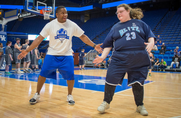 Anthoney White works with Ashley Cox on defensive skills during a skills clinic before the start of the Blue and White game at Rupp Arena. Photo by Bobby Ellis, Feb. 21, 2017