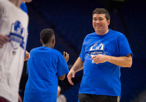 Commissioner Stephen Pruitt plays in the Special Olympics and Unified athletes blue and white game at Rupp Arena. Pruitt was a special guest along with former University of Kentucky players and local legislators.; Photo by Bobby Ellis; Feb. 21; 2017
