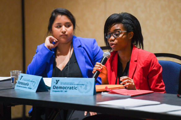 Afi Tagnedji, a sophomore at Iroquois High School (Jefferson County), reads the Democratic Republic of the Congo's opinion on working with other nations on international space exploration during the KUNA Security Council. Photo by Bobby Ellis, March 13, 2017