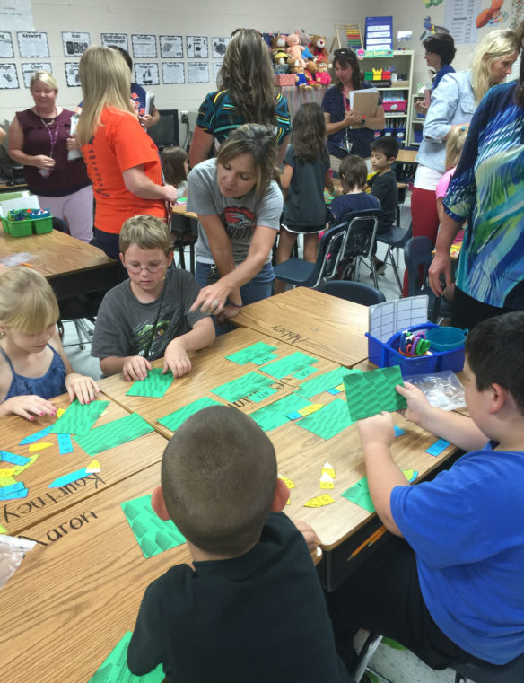 Madison County teachers observe students participating in a formative assessment lesson (FAL) in Amanda Bailey’s 3rd-grade classroom at Shannon Johnson Elementary School (Madison County). Through observing teachers using an FAL, Madison County mathematics educators learned that productive struggle can be a good thing. Submitted photo by Mendy Mills