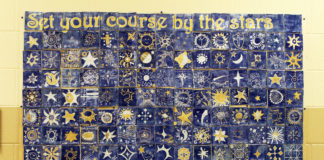 Students and family members of Maurice Bowling Middle School (Owen County) recently created a ceramic tile mosaic as a part of their Leader in Me program. The mosaic consists of 150 4-inch by 4-inch tiles and is approximately 40-inches by 60-inches. The tiles were affixed to plywood and hang in the school. Submitted photo by Anderson Sunda