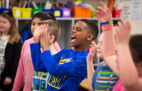 Owen LauBach, a 3rd-grader at Lemons Mill Elementary, counts out loud with his class during a GoNoodle video as part of a second recess the school added this year. Teacher say that although they've lost 10 minutes of instructional time each morning, the students are more focused and ready to learn. Photo by Bobby Ellis, March 3, 2017