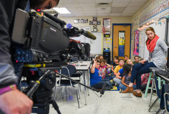 Chris Check films Sarah Burns, a 2nd-grade teacher at North Washington Elementary (Washington County), for KET as she teaches her students about volcanoes and how they change the landscape. Photo by Bobby Ellis, March 21, 2017