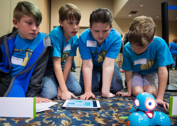 Students from Woodlawn Elementary (Boyle County) attempt to program a robot to navigate a maze during the STLP State Championship at the Lexington Convention Center.