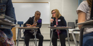 James-Etta Goodloe, left, and Jennifer Pusateri take notes while observing a class at Columbus North High School in Columbus, Ind. The school has been using Universal Design for Learning and Culturally Responsive Teaching concepts for more than a decade. Photo by Bobby Ellis, April 13, 2017