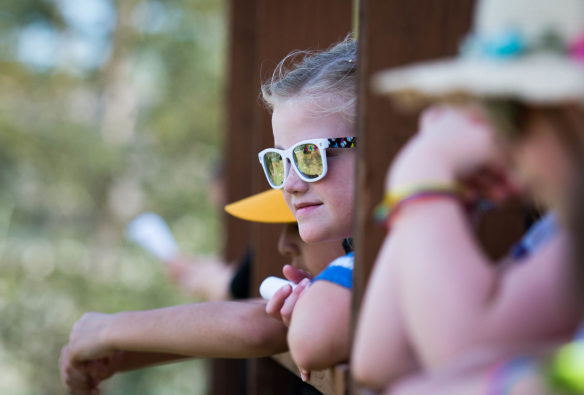 Jillian Stomberg, a 4th-grader at Western Elementary (Scott County) watches deer from a raised platform at Salato Wildlife Center. Photo by Bobby Ellis, April 14, 2017