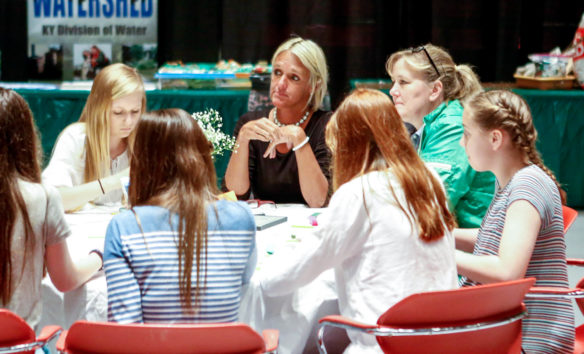 Carla Trisko, center, a teacher at Morton Middle School (Fayette County), sits with her students during the awards luncheon. Trisko was named the Kentucky Green and Healthy Schools Teacher of the Year. Photo by Mike Marsee, April 27, 2017