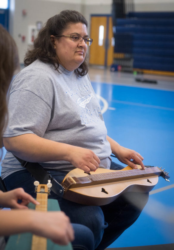 Elizabeth Sisson, music teacher at Walton-Verona Elementary, practices with her dulcimer players. Sisson began teaching students how to play dulcimers as a way to give them experience playing a stringed instrument. Photo by Bobby Ellis, May 10, 2017