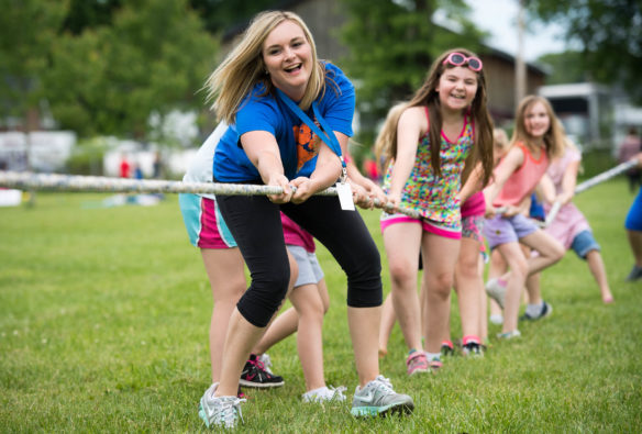 Kasey Goodlett, a 2nd-grade teacher at Taylorsville Elementary, competes in a tug-of-war with her students during the end of year field day. Photo by Bobby Ellis, May 23, 2017