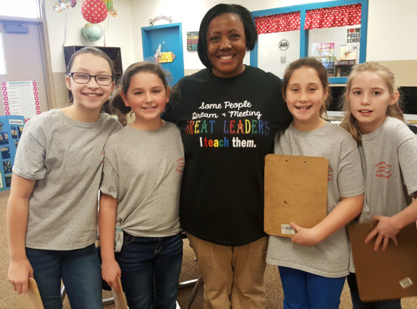 Principal Tamala Howard of Uniontown Elementary School (Union County) snaps a quick picture with 5th-grade students, from left, Evan Logsdon, Olivia Burke, Kaitlyn Thompson and Maggie Baird from the school's Leader in Me Student Lighthouse Team. Union County was one of 22 school districts to participate in kid·FRIENDLy – Kids Focused, Responsible, Imaginative, Engaged and Determined to Learn – funded by a $41 million Race-to-the-Top-District grant that focused on helping schools build personalized learning and discovering ways to empower students. (Photo submitted)