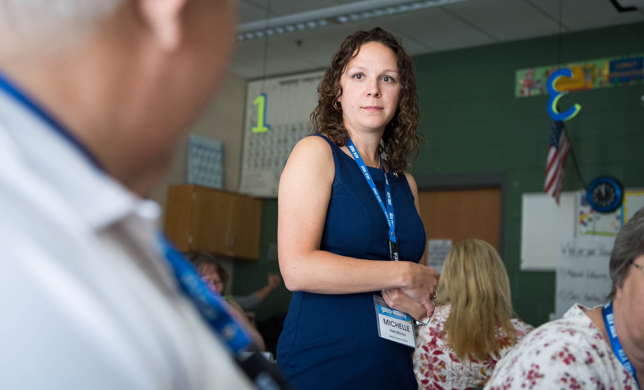 Michelle Hendricks, an instructional coach at Boston Elementary School (Nelson County), listens to a fellow educator during her presentation on reducing classroom time lost in transitions at the Let's TALK: Conversations About Effective Teaching and Learning conference. Hendricks' seminar addressed how to reduce transition time by completing necessary tasks calmly, quickly and efficiently. Photo by Bobby Ellis, June 12, 2017