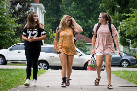 Kelsey Damron, left, Macy Dungan and Tatum Williams, freshmen at Frankfort High School (Frankfort Independent), walk to school on the first day of school.  Photo by Bobby Ellis, Aug. 1, 2017