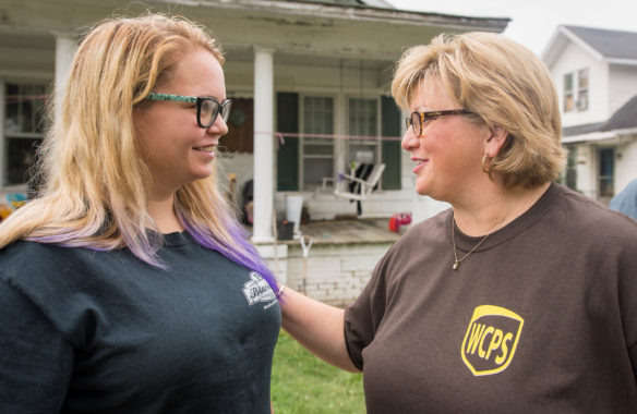 Dr. Rachel Yarbrough, superintendent of Webster County Schools, right, talks with Cammieo Armstrong during a visit to her home on the opening day of school.  Photo by Bobby Ellis, Aug. 7, 2017