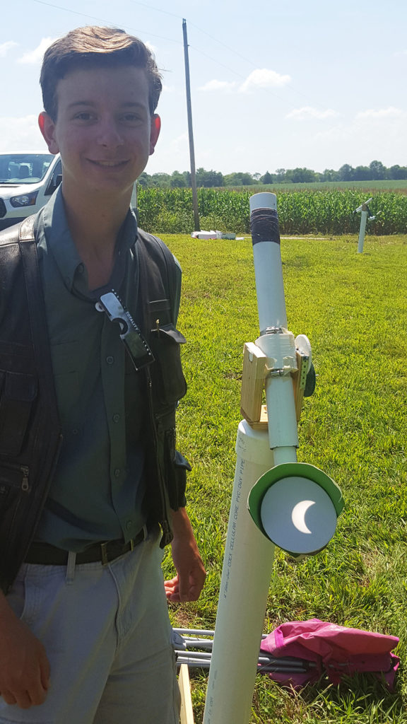 Bullitt East High School engineering student Shane Kelty shows how the Aug. 21 eclipse was visible with his PVC telescope, which includes a geared telescope mount he designed and made with a 3-D printer. Kelty was one of 14 Bullitt East engineering students that used telescopes they built to document the total solar eclipse just south of Bowling Green. Photo submitted by Darrell Vincent