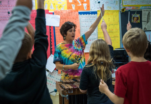 Diane Downs, the music teacher at Norton Elementary (Jefferson County), asks students who was able to keep up with a rhythm for a song. Downs is the co-founder of the Louisville Leopard Percussionists and uses her class to help drive home concepts for core classes for students. Photo by Bobby Ellis, Oct. 26, 2017