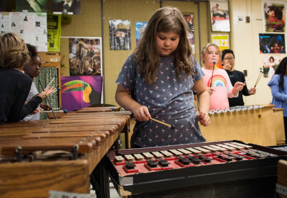 Emma Galloway, a 4th-grader at Norton Elementary (Jefferson County), practices the Norton Fight Song in Diane Downs' music class. Photo by Bobby Ellis, Oct. 26, 2017