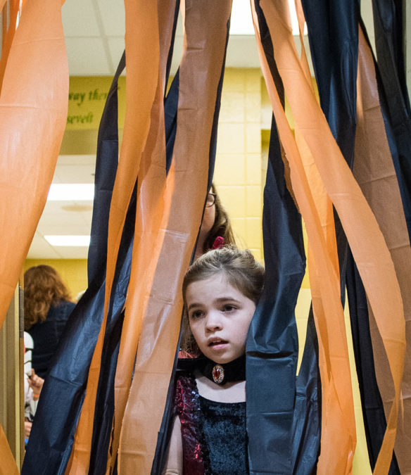 Abby Cocke enters the gym of Northside Elementary school dressed as a vampire. Photo by Bobby Ellis, Oct. 27, 2017