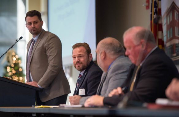 James Evans, second from left, the superintendent of Lee County schools, speaks during a panel discussion moderated by Brandon Gossett, left, of the Kentucky Department of Education's Office of Career and Technical Education,. The panel, which took place at the New Skills for Youth 2017 Fall Forum in Versailles, featured educators and others who are developing three regional career academies in the first year of New Skills for Youth Kentucky Photo by Bobby Ellis, Nov. 27, 2017