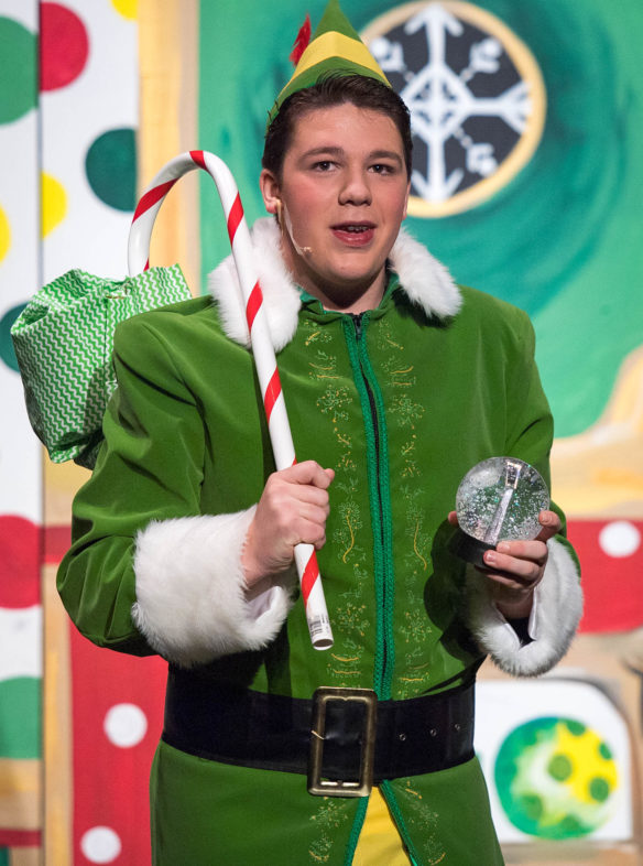 Buddy the Elf, Holden Stamper, makes his way to New York City in the opening act of Elf, Jr. the Musical. Photo by Bobby Ellis, Dec. 8, 2017