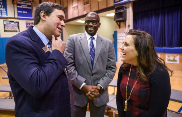 Commissioner of Education Stephen Pruitt, left, and Fayette County Superintendent Emmanuel Caulk speak with Brooke Powers after she was named as a 2017-18 Milken Educator Award winner. Powers, a 7th-grade math teacher and math department chair at Beaumont Middle School, is the only Milken Award winner from Kentucky this year, and is among just 44 honorees for 2017-18. Photo by Bobby Ellis, Jan. 9, 2018