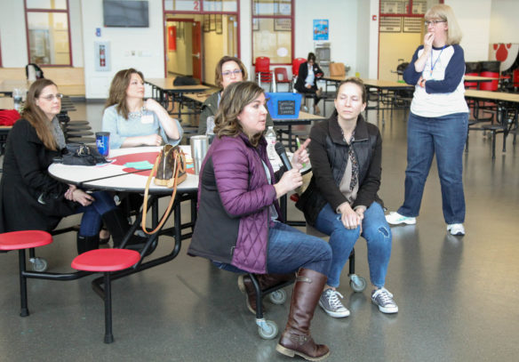 Danielle Witterstaetter, (center) a Fort Thomas Independent Schools parent, shares what she learned at ParentCamp with the attendees, including Boone County parent and ParentCamp organizer Julie Pile,, right. Photo by Brenna R. Kelly, Jan. 27, 2018.