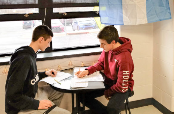 Alexander Baker, left, and Elliott Herzog speak Spanish in the Linguacafé in their classroom at Walton-Verona High School. The second core practice described in a series of articles in Kentucky Teacher explains how to incorporate more interpersonal communication into your classroom design. Submitted photo by Alaina Post