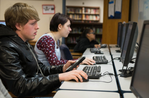 Students take assessment tests in a computer lab at Frankfort High School (Frankfort Independent). High school students taking Algebra II, biology and English II will take new, online end-of-course field tests that have been developed by Kentucky teachers during a 10-day testing window in April. Photo by Bobby Ellis, Feb. 26, 2018