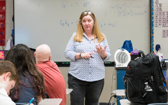 Deborah Brock, a science teacher at Simon Kenton High School (Kenton County), talks with her class about a homework assignment. Science teachers in grades K-12 are required to use at least two through-course tasks with their students during the school year. Photo by Bobby Ellis, March 29, 2018