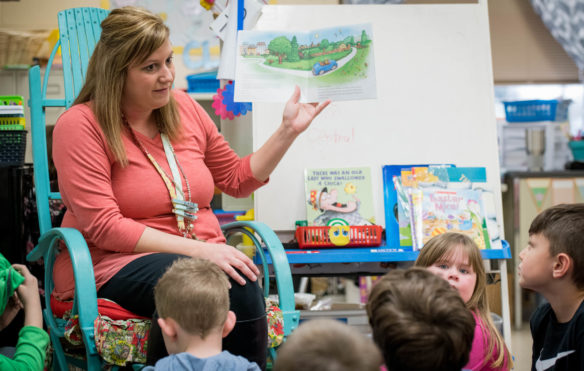 Amy Kendall, a kindergarten teacher at Graves Central Elementary, reads a book to her class. Students at Graves County are taught a behavioral standard, focusing on attitude, responsibility, manners, order and respect. Photo by Bobby Ellis, March 28, 2018