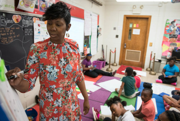 NyRee Clayton-Taylor discusses how to analyze a story with her students at Phillis Wheatley Elementary School (Jefferson County). Clayton-Taylor was named the 2019 Kentucky Elementary School Teacher of the Year. Photo by Bobby Ellis, May 1, 2018