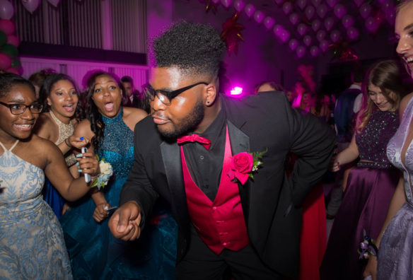 Jalin Benson, a junior at Franklin County High School, dances during the senior prom at the Kentucky Historical Society in Frankfort. Photo by Bobby Ellis, May 12, 2018