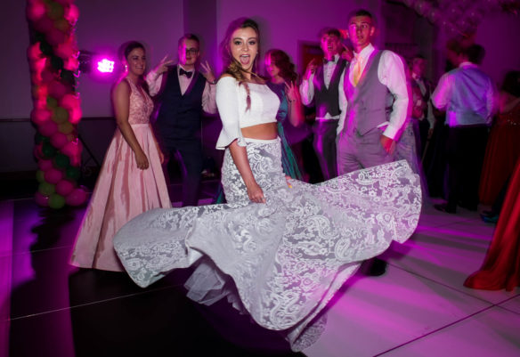 Lexie Moore, a senior at Franklin County High School, twirls on the dance floor during the senior prom. Photo by Bobby Ellis, May 12, 2018