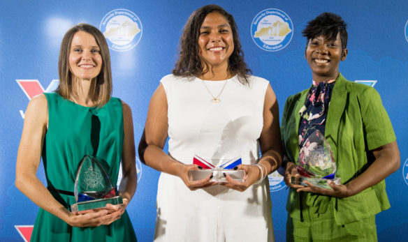  Jessica Dueñas, of Oldham County Middle School, was named as the 2019 Kentucky Teacher of the Year at a ceremony in Frankfort May 15. Tiffany Marsh, left, of Paul Laurence Dunbar High School (Fayette County), was named the 2019 Kentucky High School Teacher of the Year. NyRee Clayton-Taylor, right, of Phillis Wheatley Elementary (Jefferson County), was named the 2019 Kentucky Elementary Teacher of the Year. Photo by Bobby Ellis, May 15, 2018