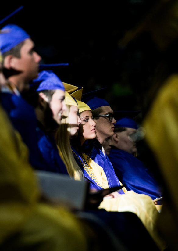 Brooke Roberts, and her classmates listen to a speech during the 2018 Campbell County High School graduation ceremony. Photo by Bobby Ellis, June 4, 2018