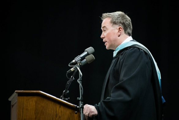 Campbell County High School principal Adam Ritter welcomes family and friends of the class of 2018 to the ceremony at BB&T Arena at Northern Kentucky University. Photo by Bobby Ellis, June 4, 2018