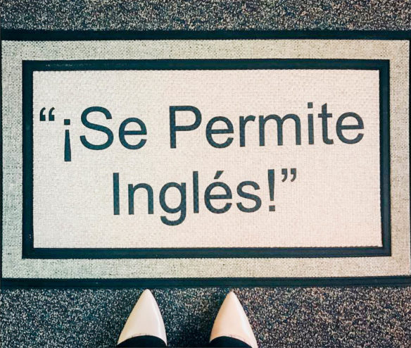 Meredith White, a high school Spanish teacher in Georgia, uses a doormat that says “English is permitted!” in Spanish to remind herself to stay comprehensible while speaking in the target language 90 percent of the time. If she realizes her students are not understanding her, she asks them, in Spanish, if English is permitted while pointing to the mat. This is one tool White uses to make speaking in the target language feel enjoyable for her students, not like a constant test. Submitted photo by Meredith White