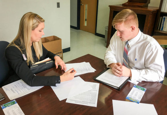 Garrett Duncan, right, a student at Calloway County High School, interviews with Allyson Foster, an executive adviser in the Kentucky Department of Community Based Services. The interview is part of a program in which high school students interested in a career in social work can obtain apprenticeships in local DCBS offices. Duncan was the first student enrolled in the pilot program, which fills a need in a field in which it can be difficult to recruit and retain workers. Photo submitted